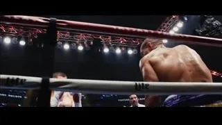 boxer punching in ring with crowd — Southpaw