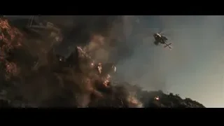 helicopter flying over burning hillside — Iron Man 3