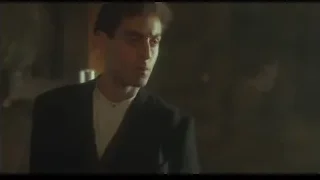 young man in suit in dimly lit room — Peaky Blinders