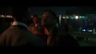 Two men conversing at night event — Creed 3