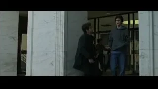 people walking on brick sidewalk — The Social Network