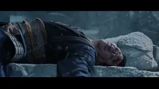 Injured man lying on rubble — Doctor Strange 2
