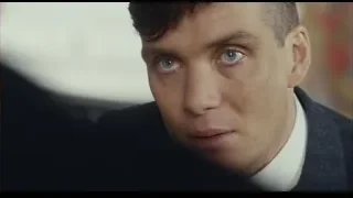 man in suit looking aside seriously — Peaky Blinders