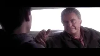 two men in car, younger man pointing — Spider Man 2