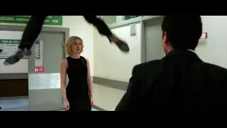 man and woman in hospital hallway — Lucy
