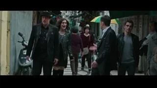 People walking in narrow urban alleyway — Now You See Me 2