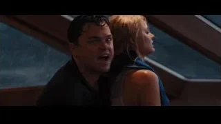 man and woman sitting on boat — The Wolf Of Wall Street