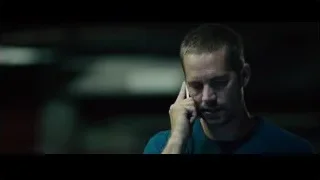 Woman on phone in dimly lit room — Furious Seven
