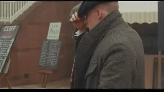 Two men in berets on sidewalk — Peaky Blinders