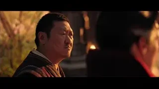 Man in traditional Chinese outfit outdoors — Doctor Strange 2