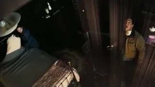 man and woman in dimly lit bedroom — Interstellar