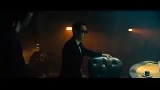 two men in dimly lit futuristic bar — John Wick: Chapter 4
