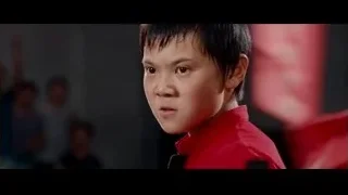 Close-up of young boy's face in red shirt — The Karate Kid