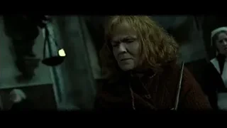 Woman holding sword in dark room — Harry Potter and the Deathly Hallows 2