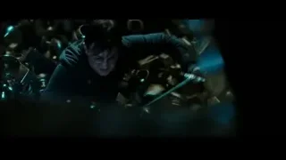 Harry Potter lying on pile of gold coins — Harry Potter and the Deathly Hallows 2