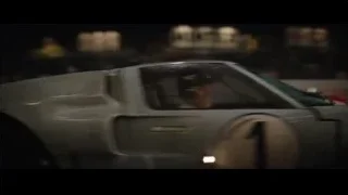 sports car on wet race track at night — Ford v Ferrari