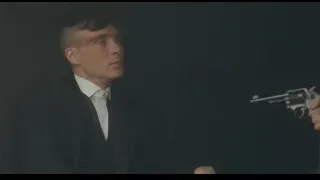Man holding gun in dark room — Peaky Blinders