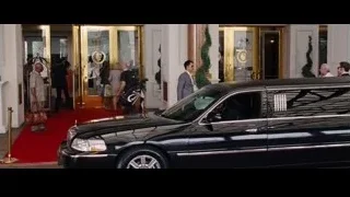 black limousine in front of luxurious building — The Big Short