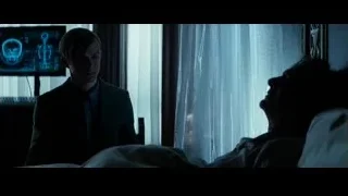 man in suit on bed watching TV — The Amazing Spider Man 2