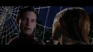 man in spider-suit and woman at night — Spider Man 2