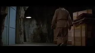 man walking through a dark cave — Bruce Lee: Enter The Dragon