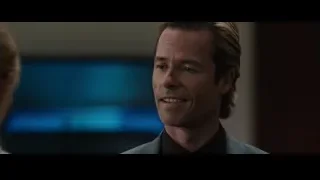 man in suit with blonde hair smiling — Iron Man 3