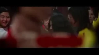 Man in red jacket in a crowd — Bruce Lee: Enter The Dragon