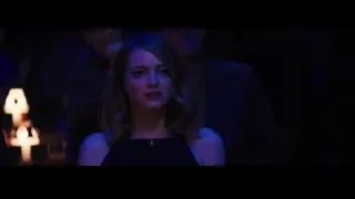 young woman in black dress in room — La La Land