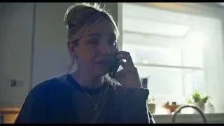 person talking on mobile phone in kitchen — The Bear