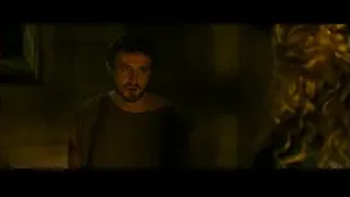man and woman in dimly lit stone room — Gladiator 2