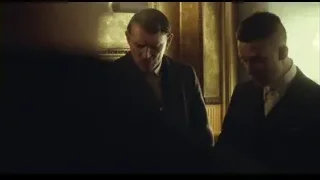 two men in suits in dimly lit room — Peaky Blinders