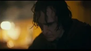 man's face with serious expression — Joker