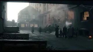 People walking on old industrial street — Peaky Blinders