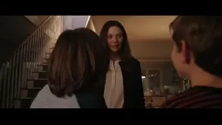 young woman talking to man in hallway — Doctor Strange 2