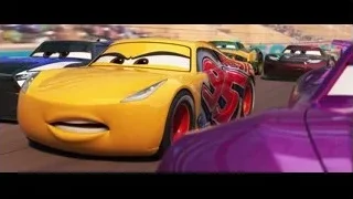 yellow race car on track with other cars — Cars 3