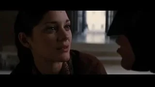 serious woman with closed eyes — Batman: The Dark Knight Rises