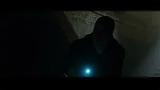 Young man holding blue flashlight in tunnel — Now You See Me 2