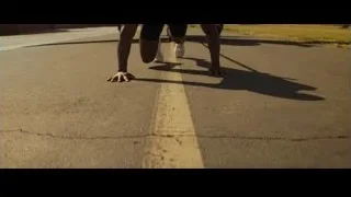 man doing push-ups on runway — Creed 3