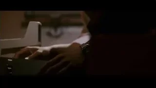 person holding remote in dark room — The Persuit of Happyness