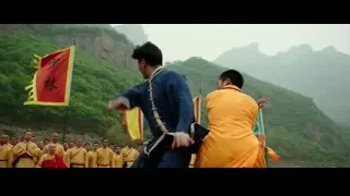 People watching man with orange flag — Bruce Lee: Birth of The Dragon