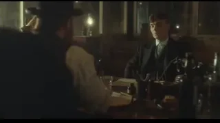 Two men at dimly lit table with typewriter — Peaky Blinders