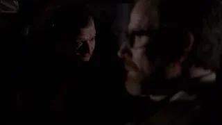 two men facing each other, one with gun — Breaking Bad