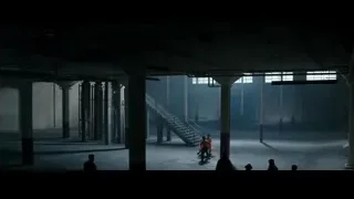 People walking in dimly lit industrial space — Bruce Lee: Birth of The Dragon