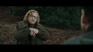 Man in green jacket holding gun in woods — Harry Potter and the Goblet of Fire