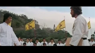 Men in white karate uniforms with yellow flags — Bruce Lee: Enter The Dragon