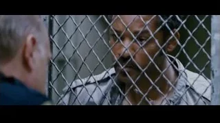 man behind chain-link fence — The Persuit of Happyness
