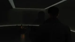 person standing in dark room with light — Blade Runner 2049