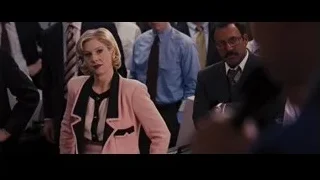 woman in pink blazer, head down, distressed — The Wolf Of Wall Street
