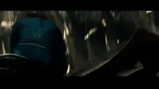person's hand working on wood — Superman: Man of Steel