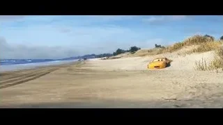 Toy car parked on sandy beach — Cars 3